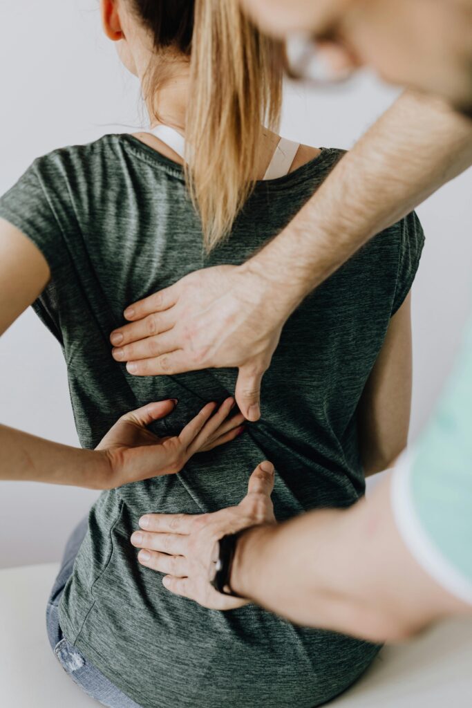 Benefits of Seeing a Spine Doctor When Sudden Back Pain Occurs Regenerative Medicine & Orthopedics Miami Chiropractor adjusting patient's back.